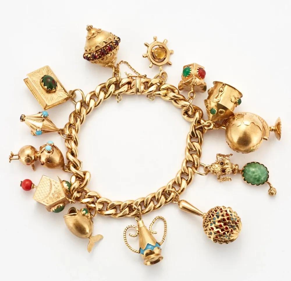 Important Curb bracelet and tassels yellow verguld