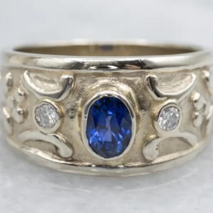 Bezel-Set Sapphire and Diamond Wijd Gold Ring