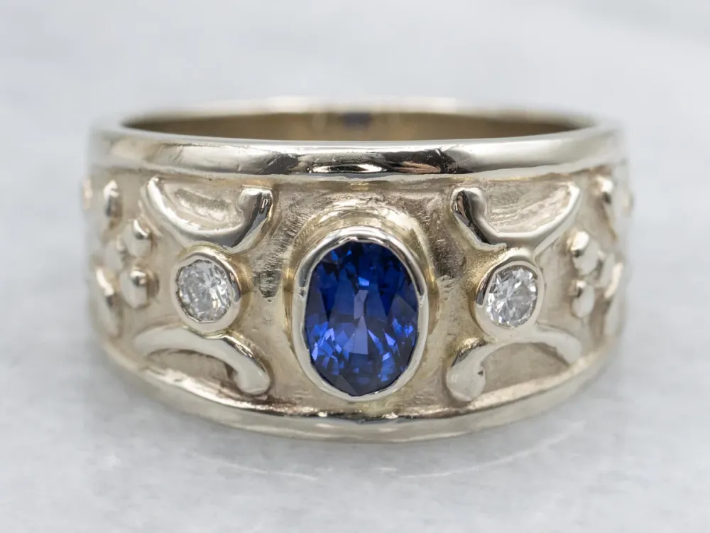 Bezel-Set Sapphire and Diamond Wijd Gold Ring