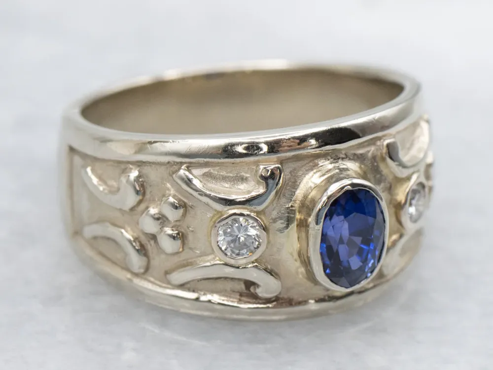 Bezel-Set Sapphire and Diamond Wijd Gold Ring