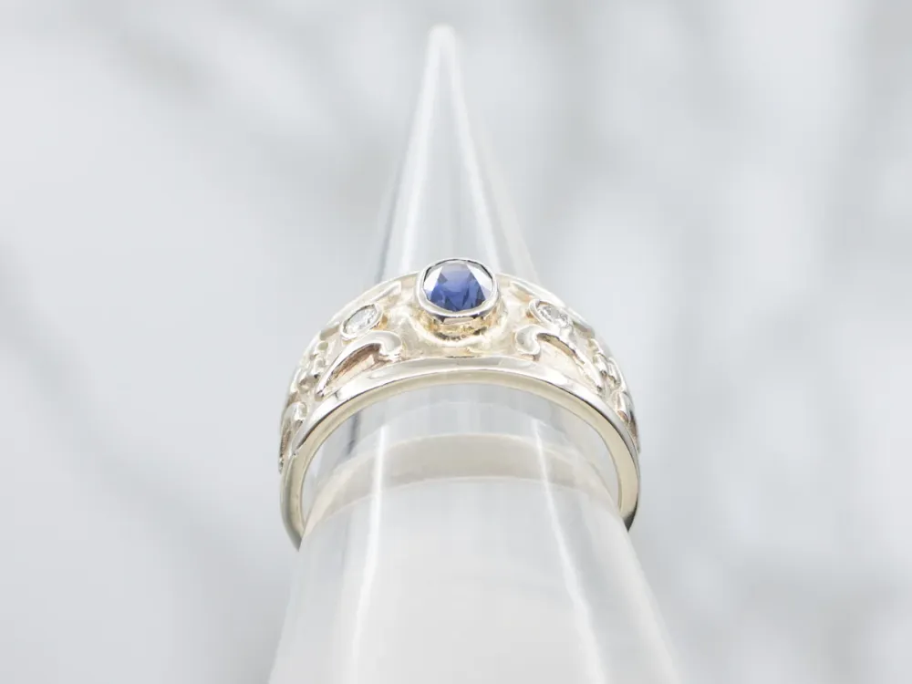 Bezel-Set Sapphire and Diamond Wijd Gold Ring