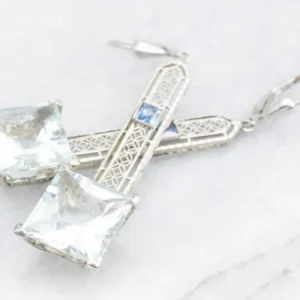 Aquamarine Filigree Drop Earrings Sapphire Accents voor beton en steen