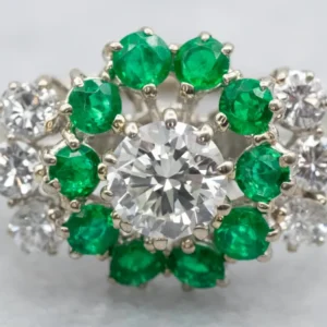 Contemporain Diamond and Emerald Halo Engagement Ring