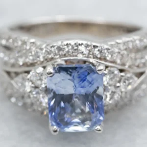 Curved Sapphire and Diamond Engagement Ring - DIN Norm