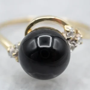 Deep Black Onyx and Diamond Bypass Ring