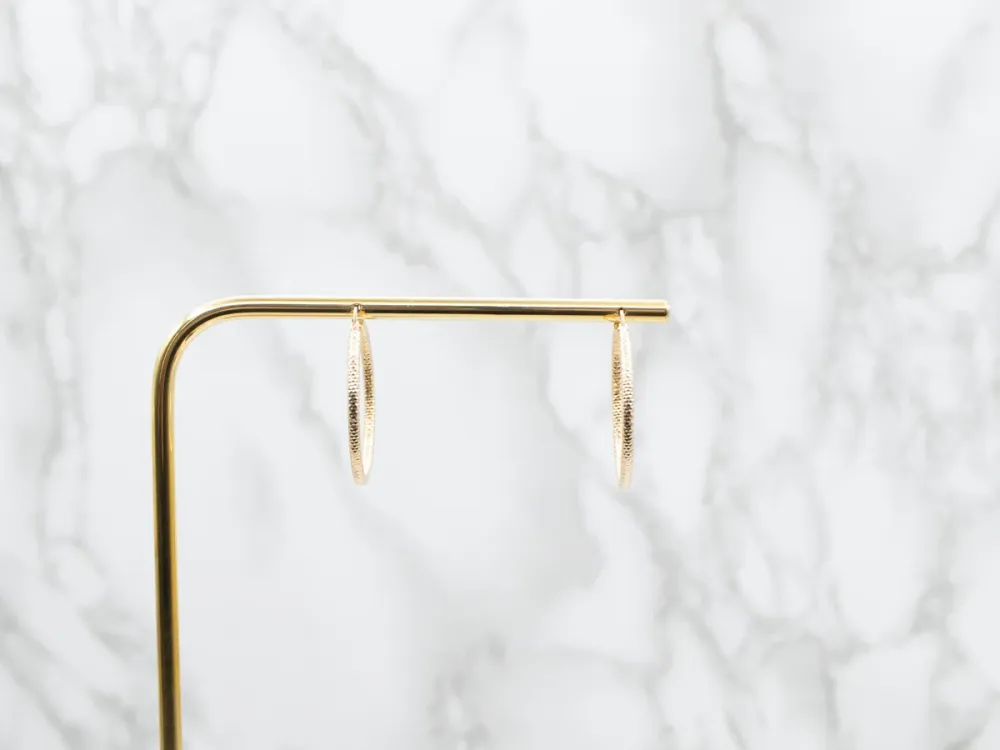 Faceted Goud Tube Hoop Earrings