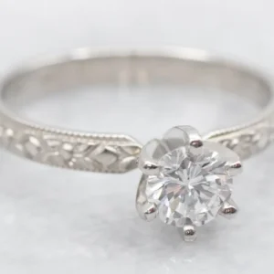 Gegalvaniseerd Forget-Me-Not Platinum and Diamond Solitaire Engagement Ring