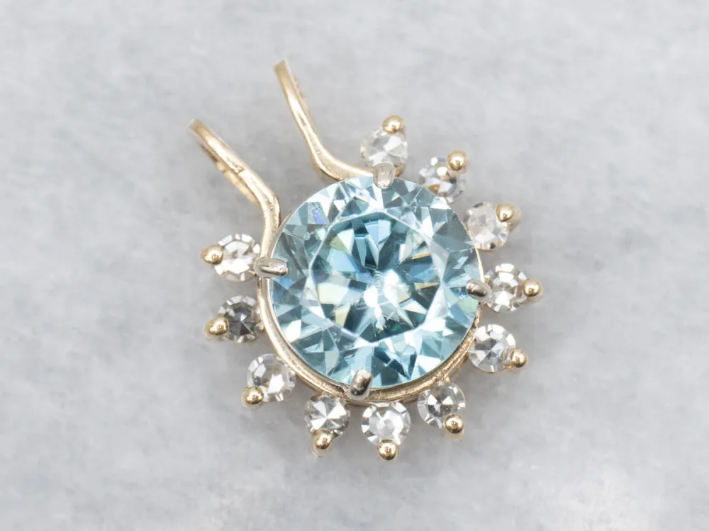 Icy Blue Zircon and Diamond Halo Pendant