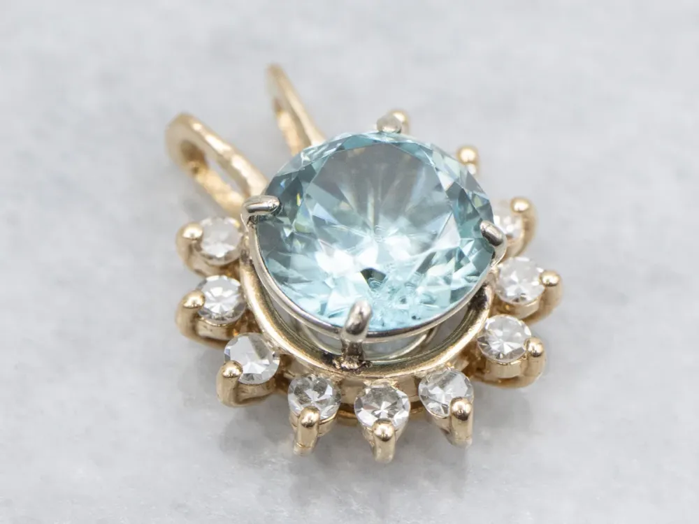 Icy Blue Zircon and Diamond Halo Pendant