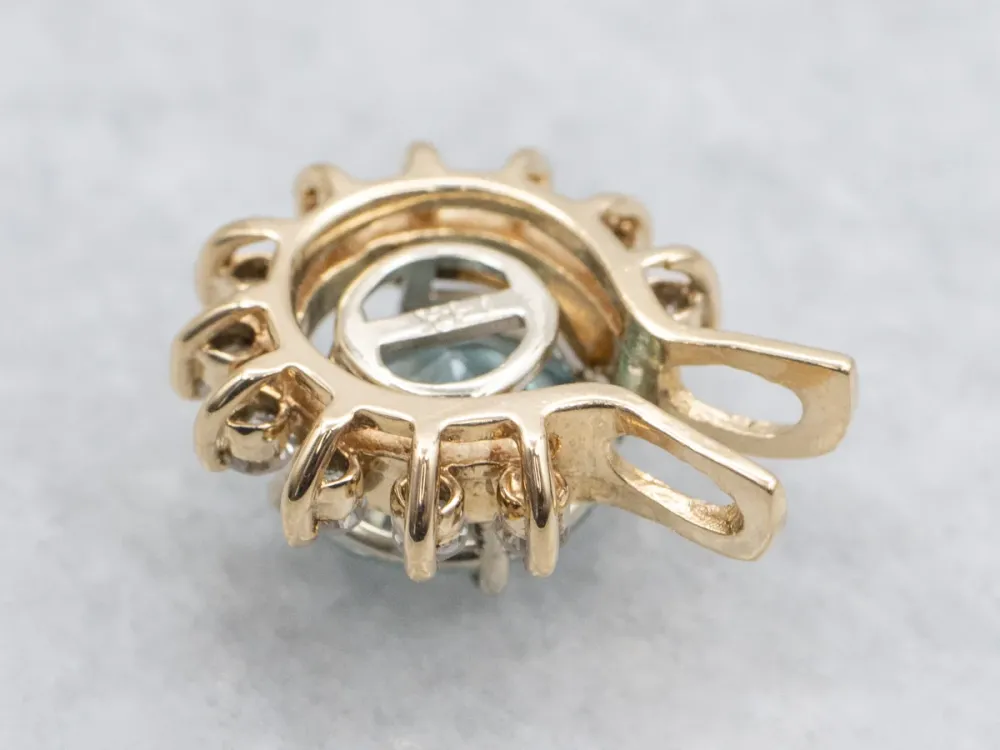 Icy Blue Zircon and Diamond Halo Pendant