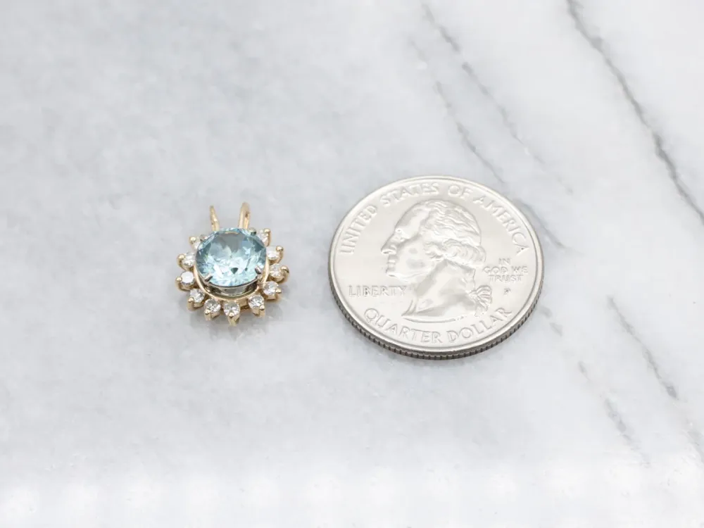 Icy Blue Zircon and Diamond Halo Pendant