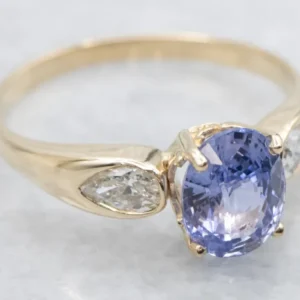 Modern Glad Gold Purple Sapphire and Diamond Ring