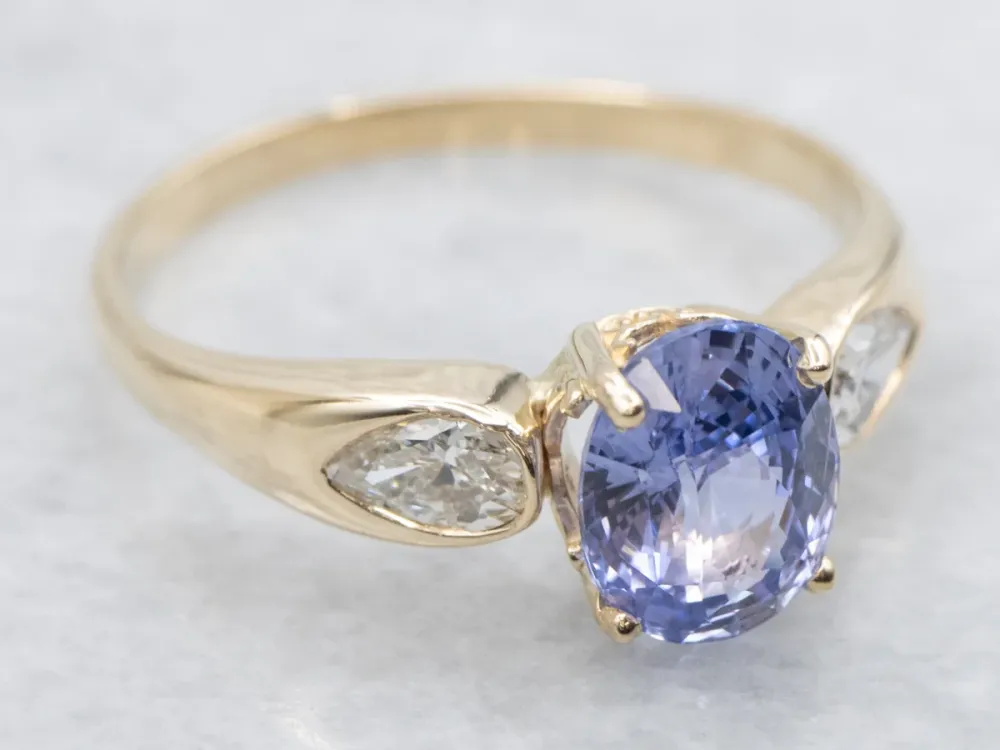 Modern Glad Gold Purple Sapphire and Diamond Ring