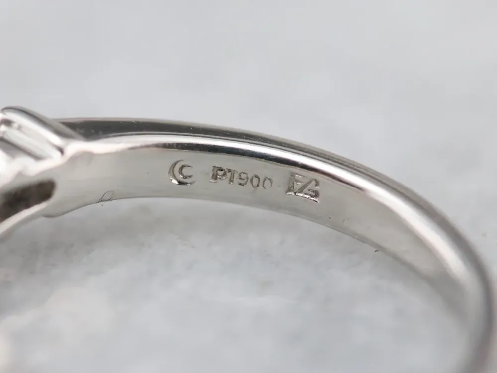 Modern Platinum Sapphire and Diamond Engagement Ring
