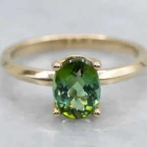 Oval Cut Green Tourmaline Yellow Gold Solitaire Ring