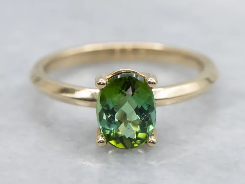 Oval Cut Green Tourmaline Yellow Gold Solitaire Ring