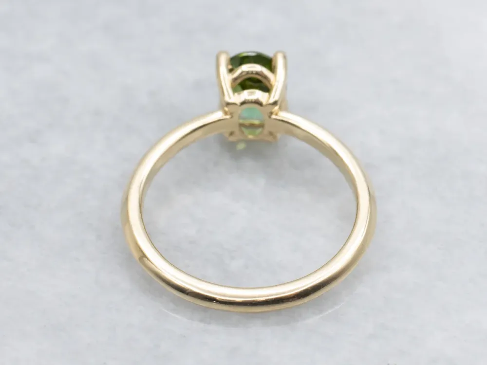 Oval Cut Green Tourmaline Yellow Gold Solitaire Ring