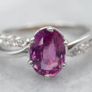 Pretty Pink Sapphire and Diamond Engagement Ring
