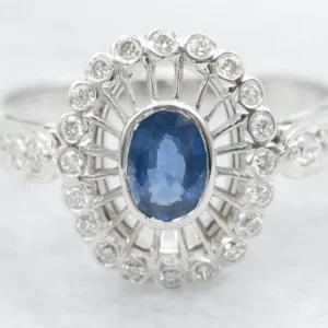 Vintage Sapphire and Diamond Halo Engagement Ring