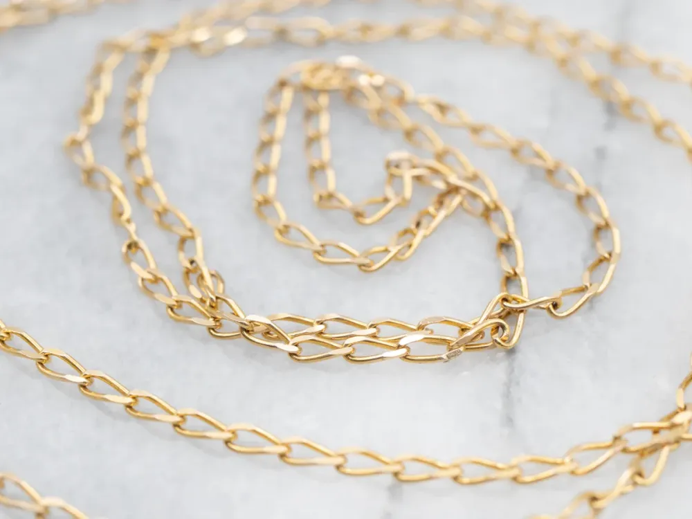 Yellow Gold Elongated Curb Chain Spring Ring Clasp