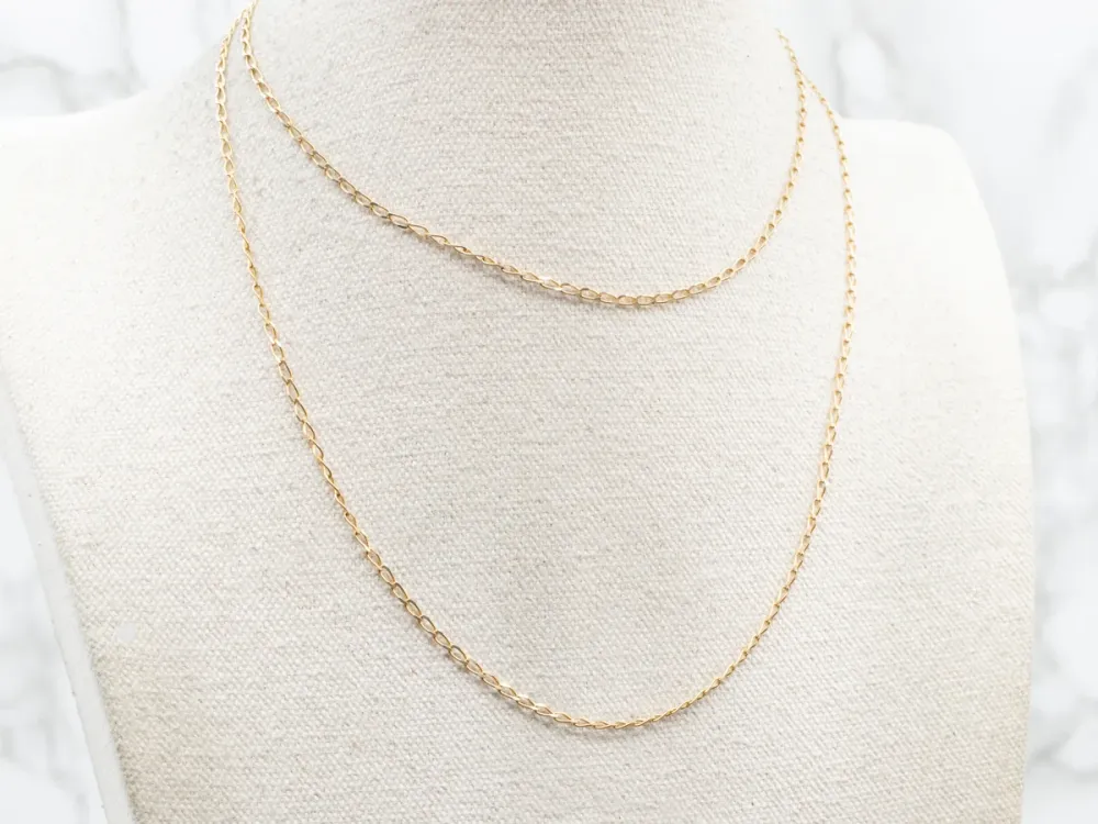 Yellow Gold Elongated Curb Chain Spring Ring Clasp
