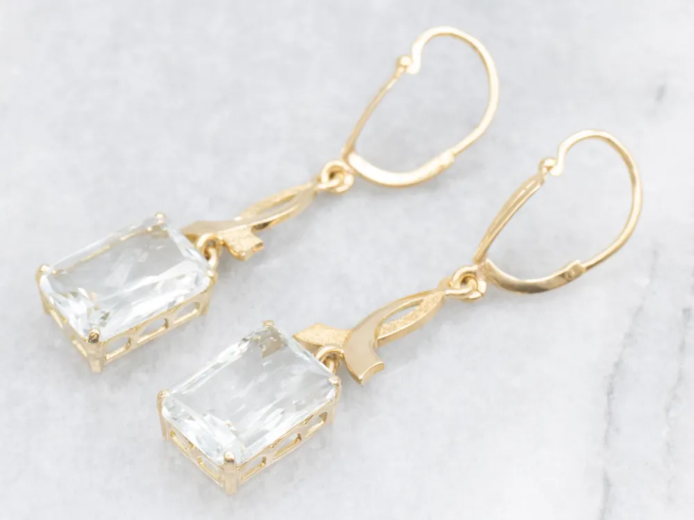 Zeeblauw Topaz and Gold Cancer Awareness Drop Earrings