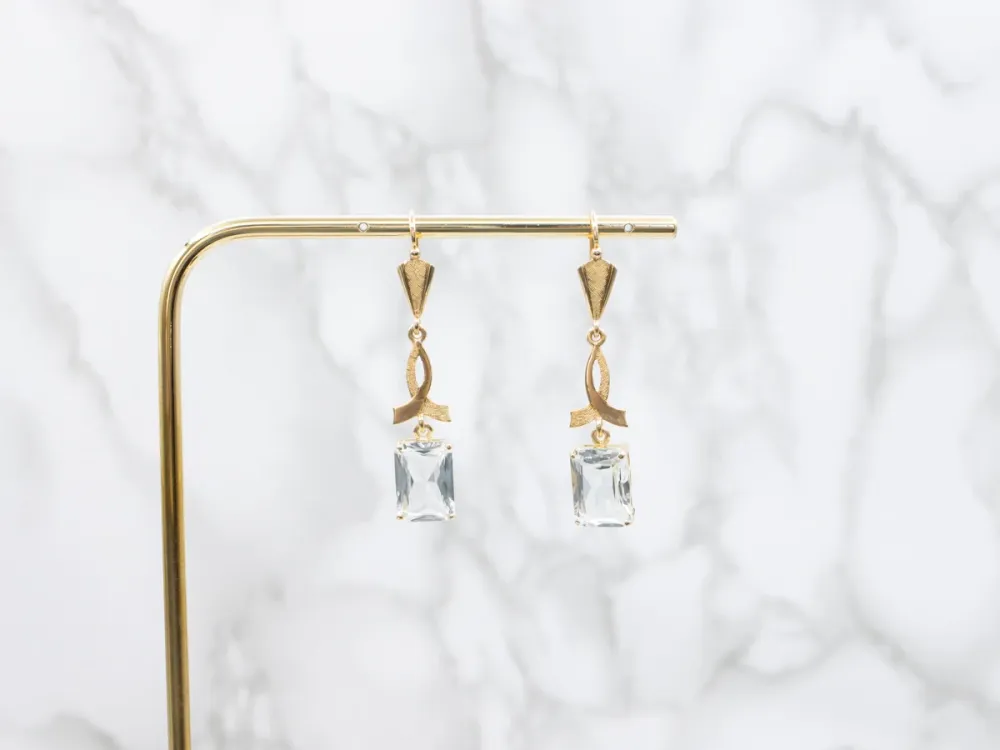 Zeeblauw Topaz and Gold Cancer Awareness Drop Earrings
