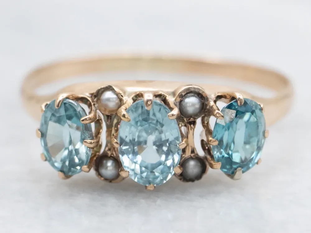 Zeeblauw Zircon and Seed Pearl Antique Rose Gold Ring
