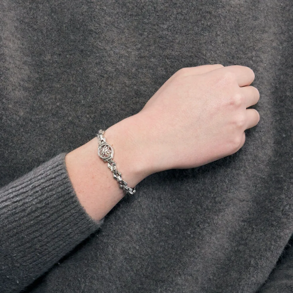 Watch bracelet transformed into white goud and diamond shine