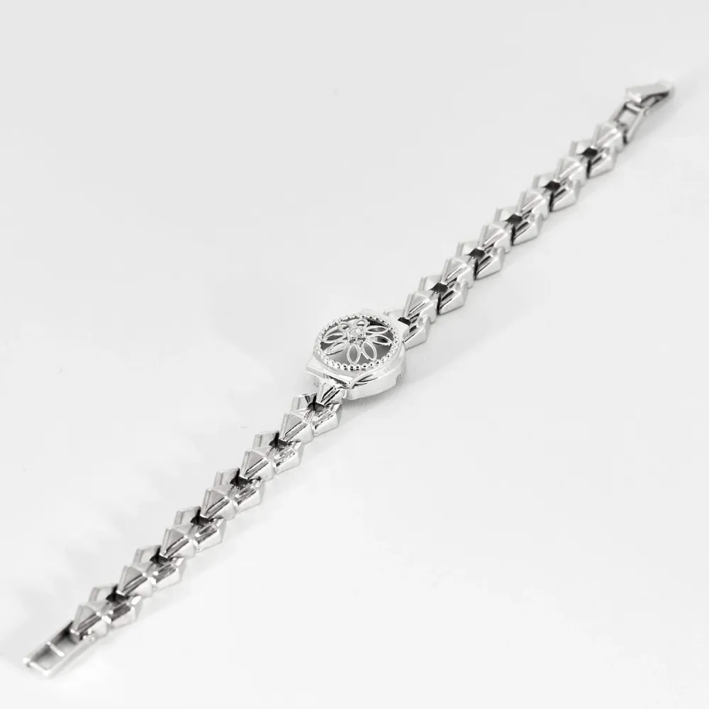Watch bracelet transformed into white goud and diamond shine