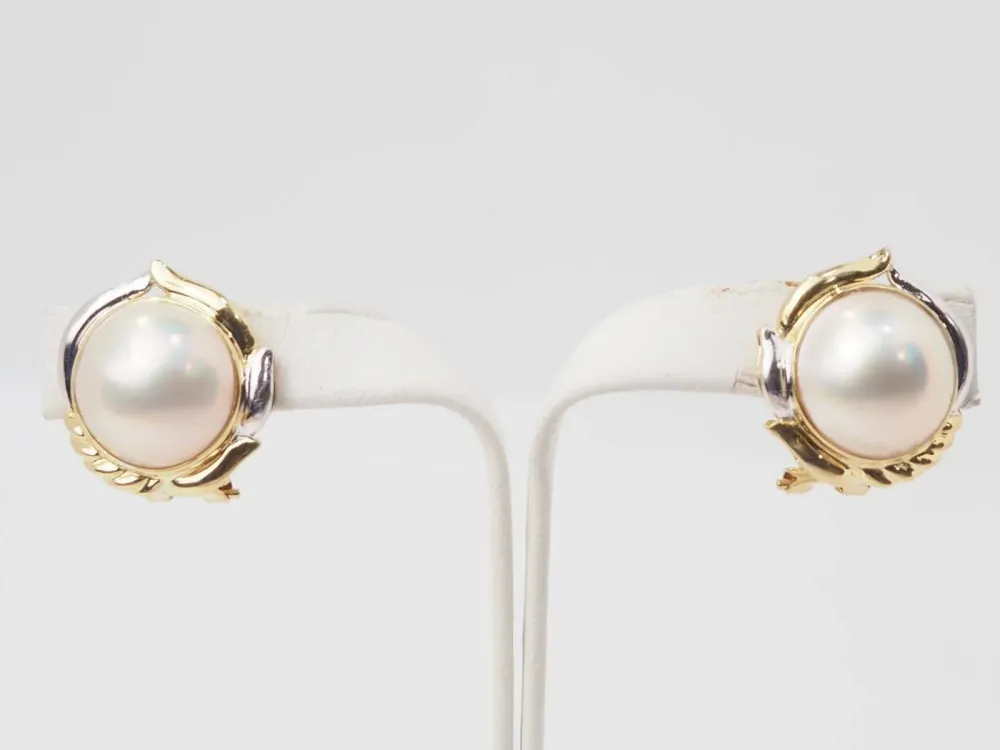 Important earrings dubbele kleur gold and half pearls