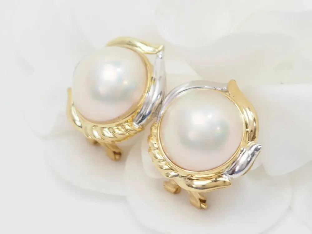 Important earrings dubbele kleur gold and half pearls