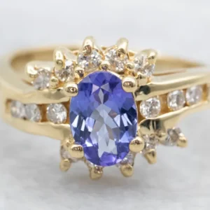 Modern Tanzanite and Diamond Halo Ring