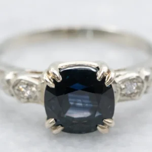 Retro Era Cushion Cut Sapphire and Diamond Engagement Ring