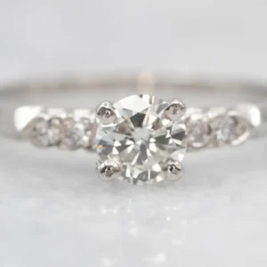 Retro Platinum and Diamond Encrusted Engagement Ring