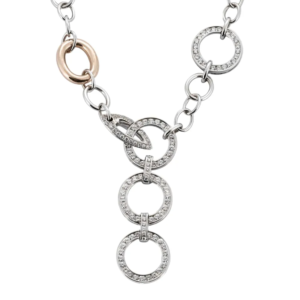 Yellow and white gold necklace round links and diamonds
