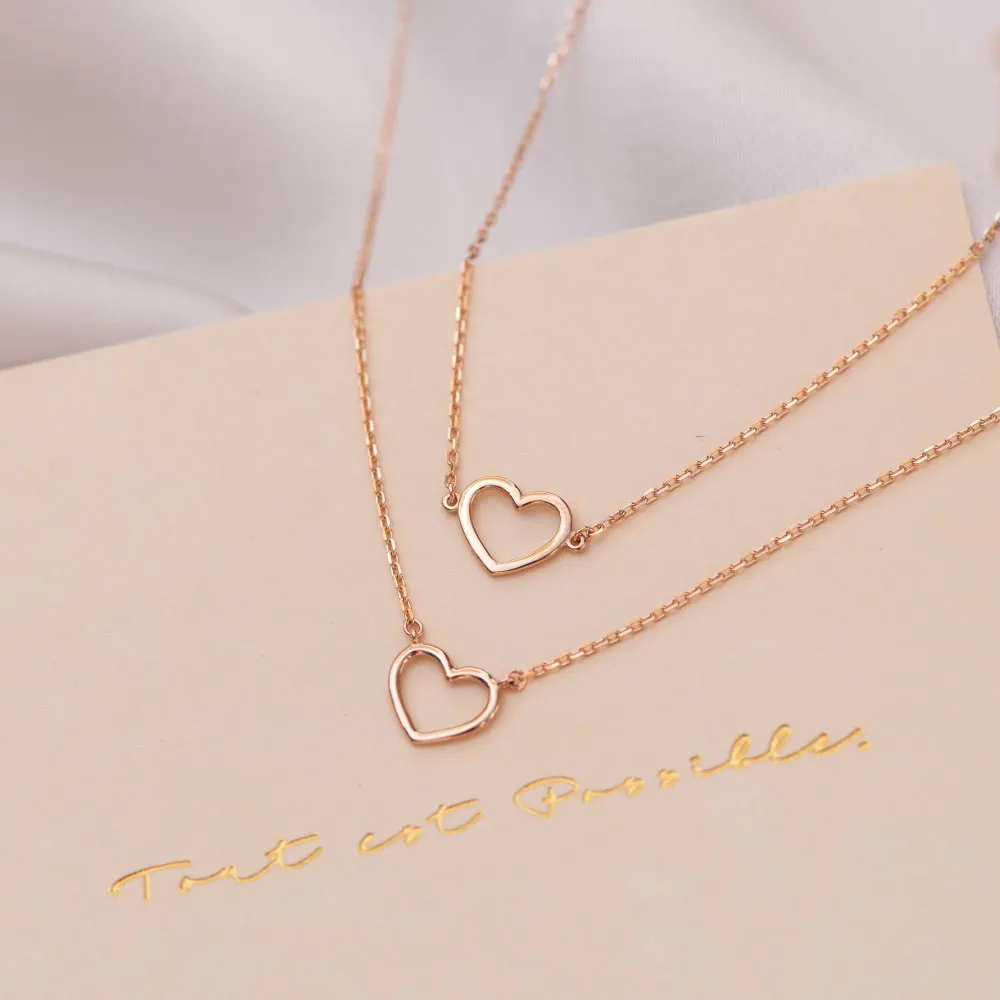 Industrieel Zwaar Belastbaar Cadeau d'Isabel 14 karaat rosé gouden ketting en armband set met hart