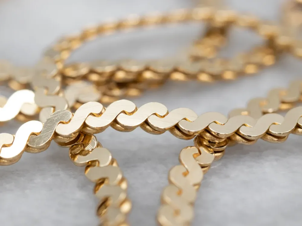 Yellow Gold Serpentine Chain Lobster Clasp