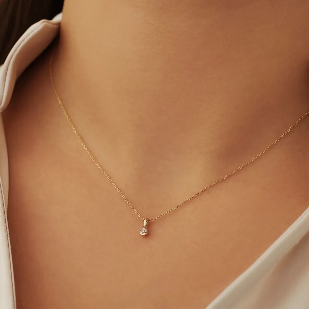 Zware Klasse De la Paix Inaya 14 karaat gouden ketting met diamant 0.01 karaat