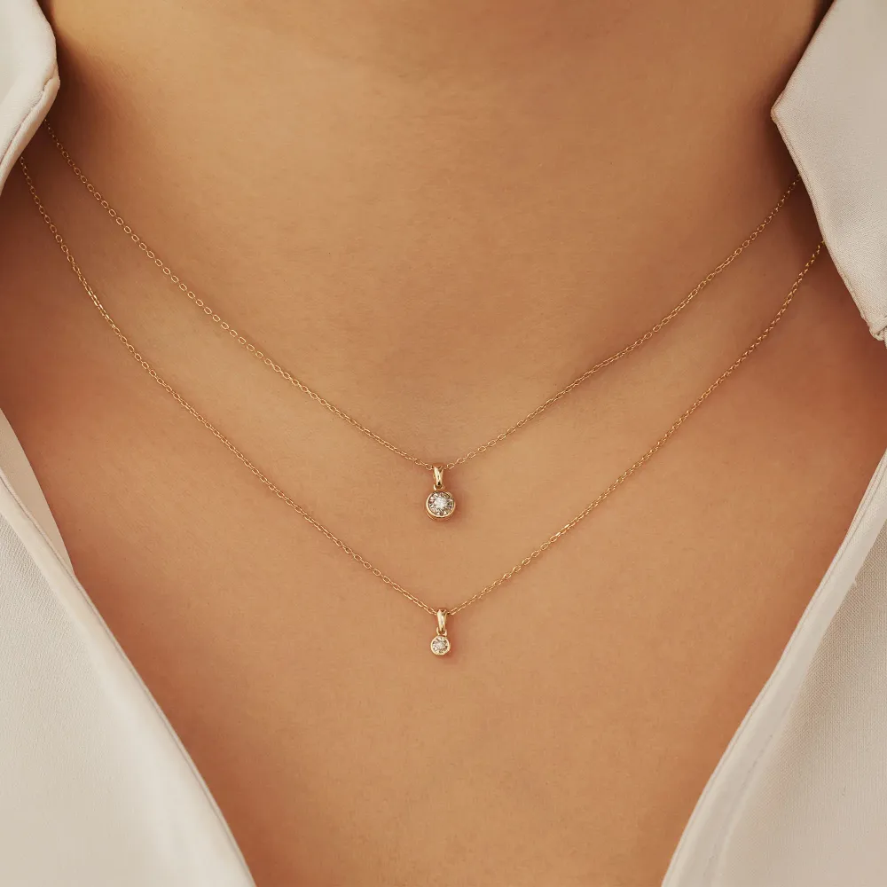 Zware Klasse De la Paix Inaya 14 karaat gouden ketting met diamant 0.01 karaat