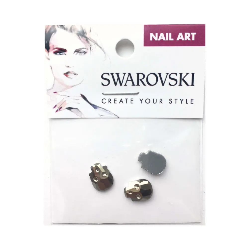 10x7.5mm Swarovski Skull Flat Back - Metallic Light Goud