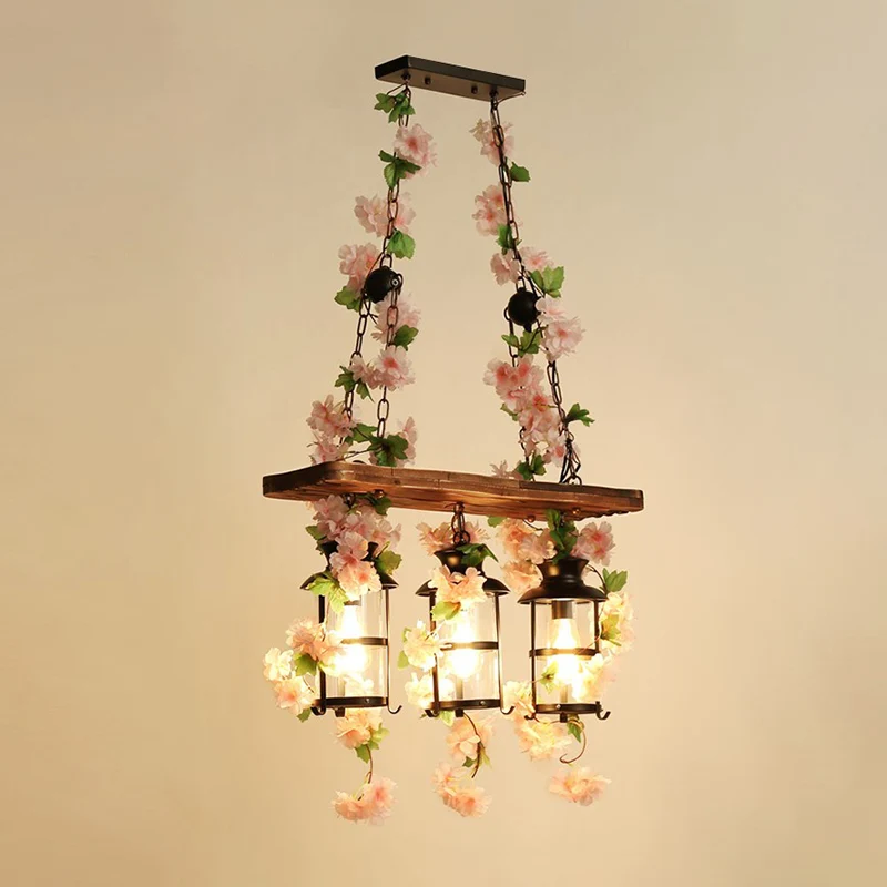 Metalen kooi eilandverlichting Industriële restaurant hanglamp met plantendecoratie