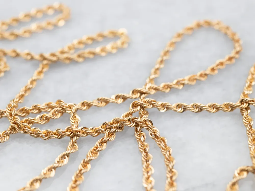 Long Gold Rope Twist Chain Barrel Clasp