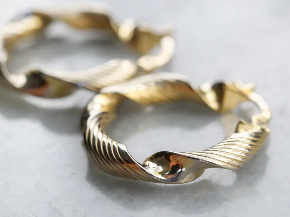 Twisted Goud Ribbon Hoop Earrings