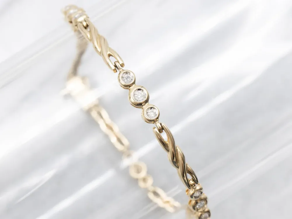 Twisting Gold Bezel Set Diamond Link Bracelet