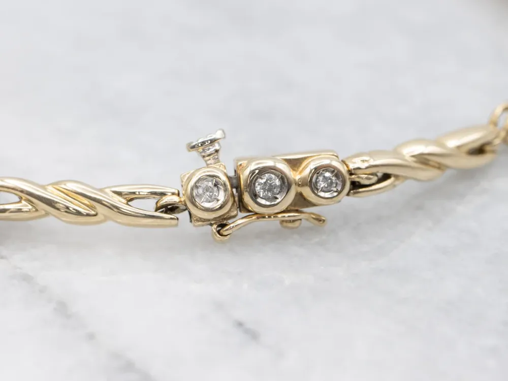 Twisting Gold Bezel Set Diamond Link Bracelet