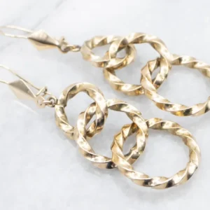 Twisting Graduating Gouden Ring Drop Earrings
