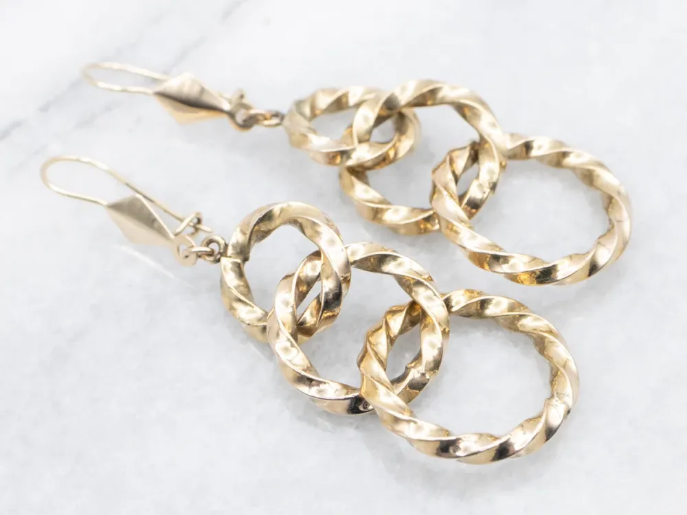 Twisting Graduating Gouden Ring Drop Earrings