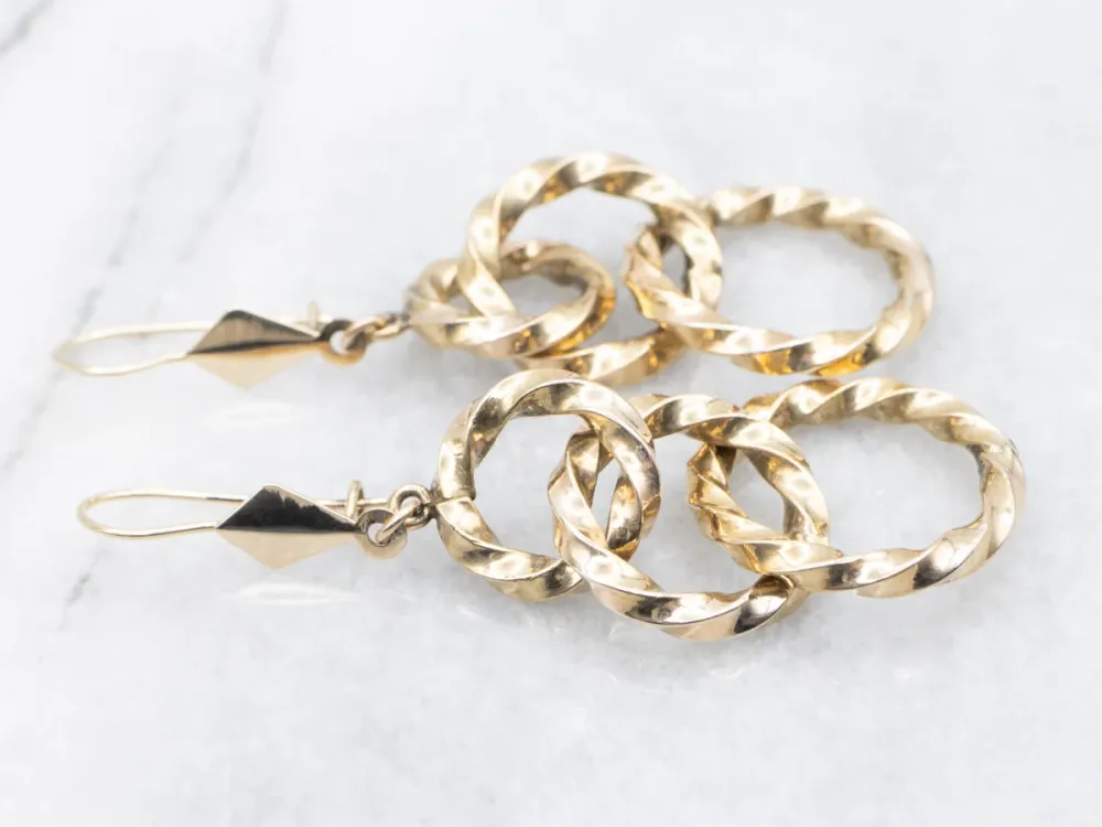 Twisting Graduating Gouden Ring Drop Earrings