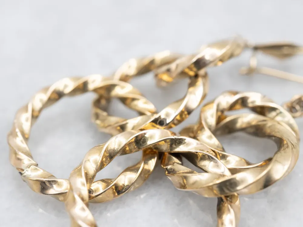 Twisting Graduating Gouden Ring Drop Earrings